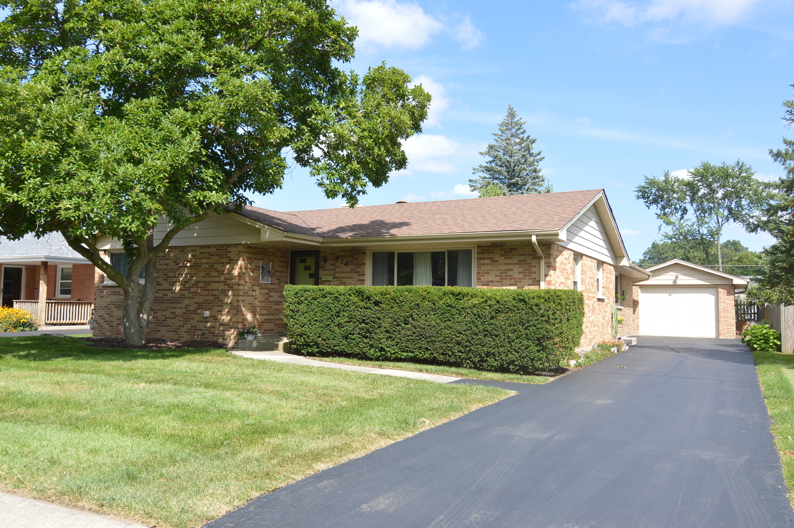 414 Brown Street Wauconda, IL 60084 - Photo 1 of 29 a front view of a house with a yard and garage