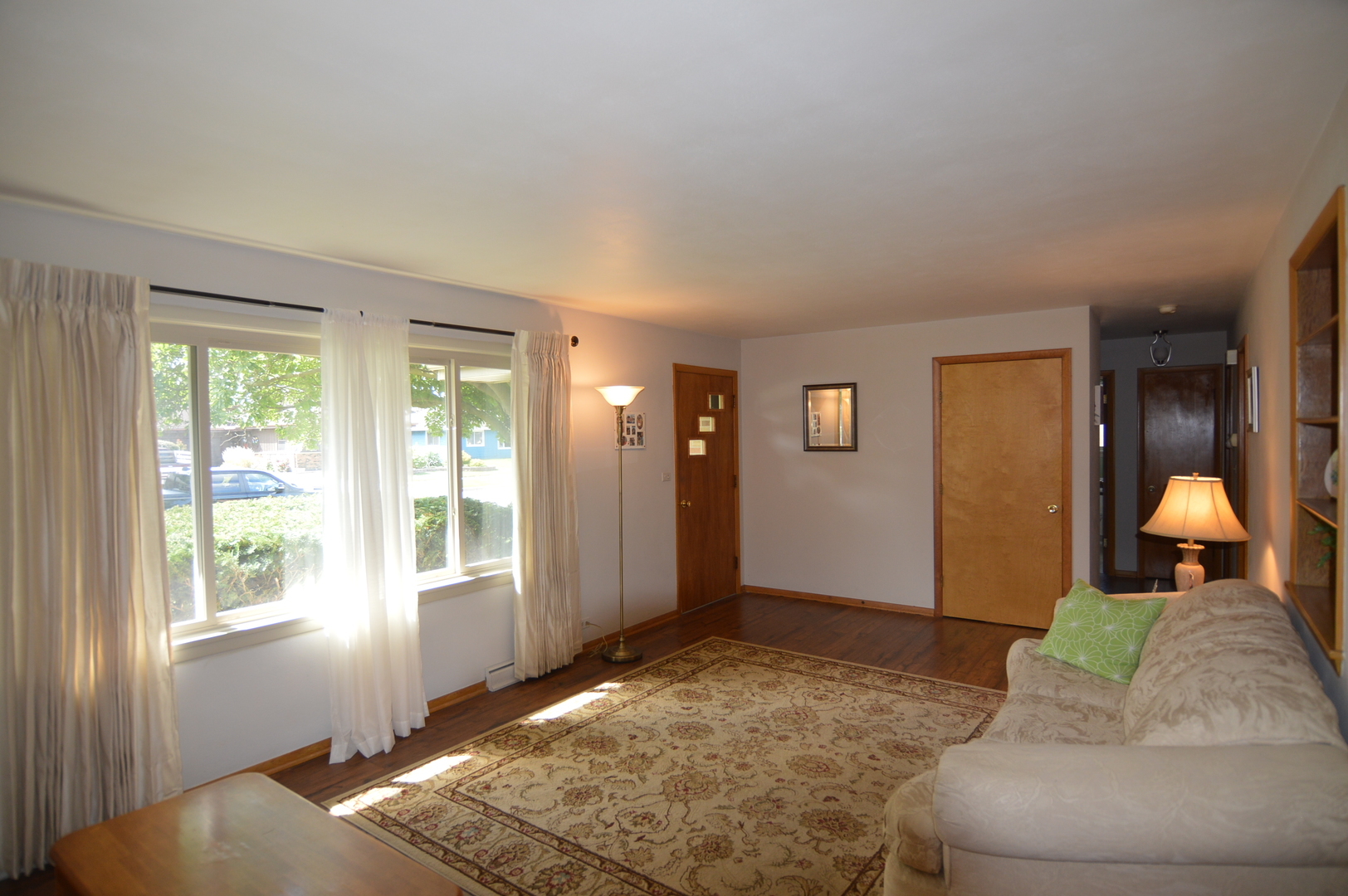 414 Brown Street Wauconda, IL 60084 - Photo 12 of 29 a bedroom with a bed and wooden floor