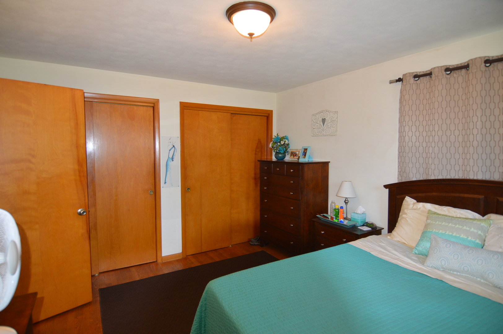 414 Brown Street Wauconda, IL 60084 - Photo 15 of 29 a bedroom with a bed and a dresser