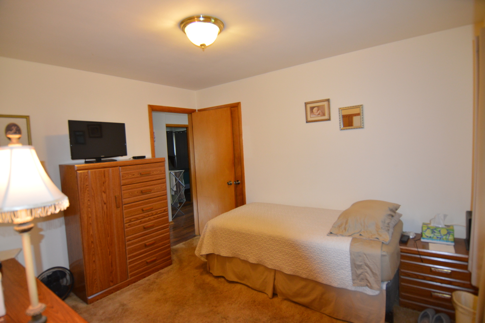 414 Brown Street Wauconda, IL 60084 - Photo 19 of 29 a bedroom with a bed and furniture