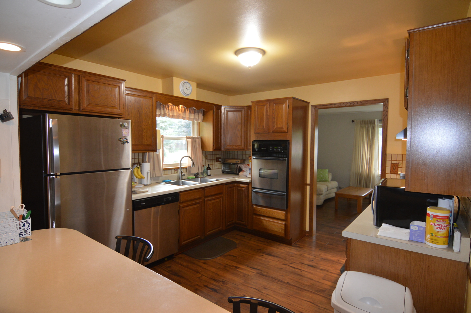 414 Brown Street Wauconda, IL 60084 - Photo 3 of 29 a kitchen with stainless steel appliances granite countertop a refrigerator sink and stove