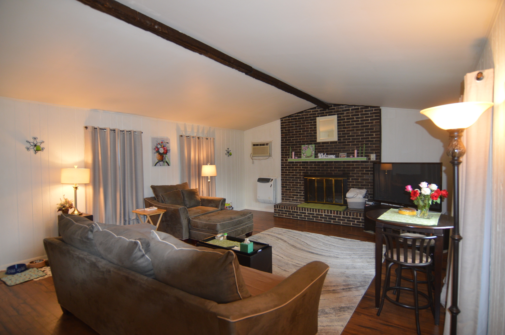 414 Brown Street Wauconda, IL 60084 - Photo 5 of 29 a living room with furniture and a fireplace