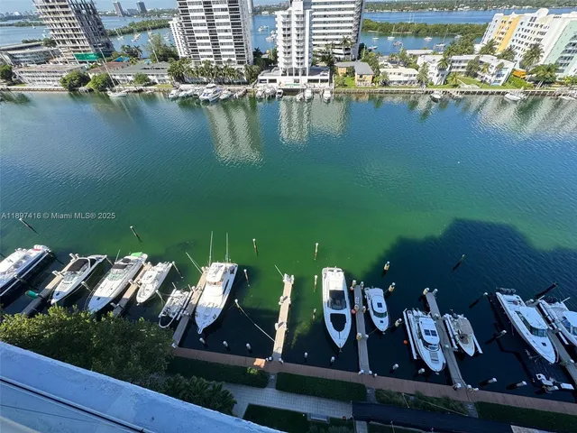 a view of swimming pool with seating space