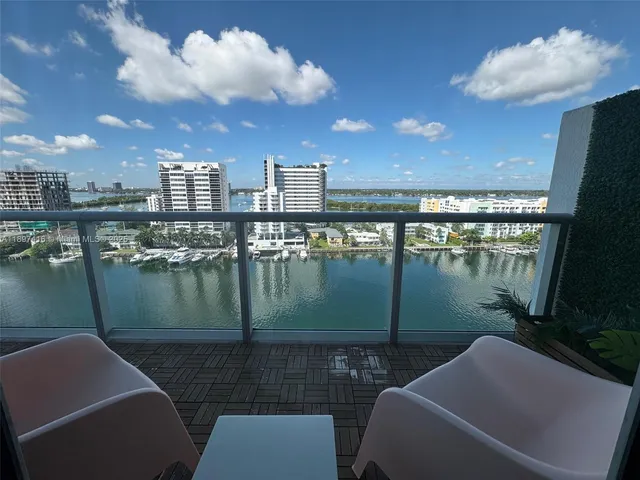 a view of a lake from a balcony