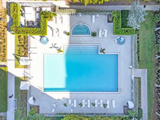 aerial view of a house with a garden