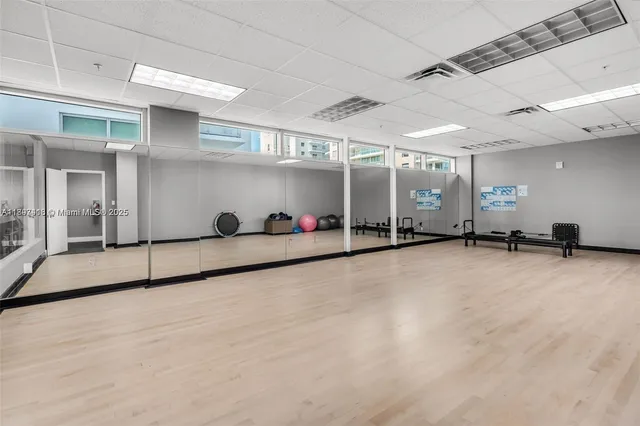 a view of a projector room with gym equipment