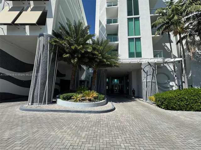 a view of a front door and fire pit
