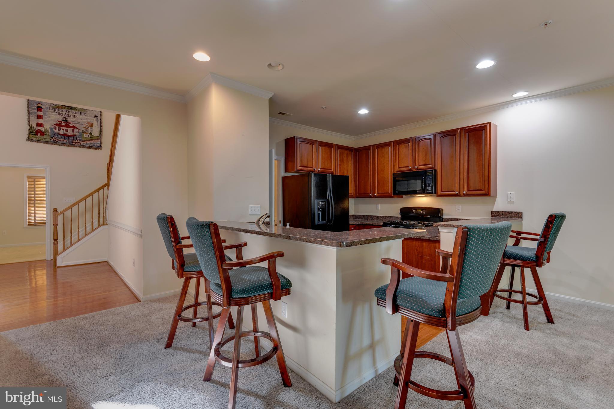 712 Ruxton Road, Unit 68 Solomons, MD 20629 - Photo 11 of 60 Granite counters planned for seating too