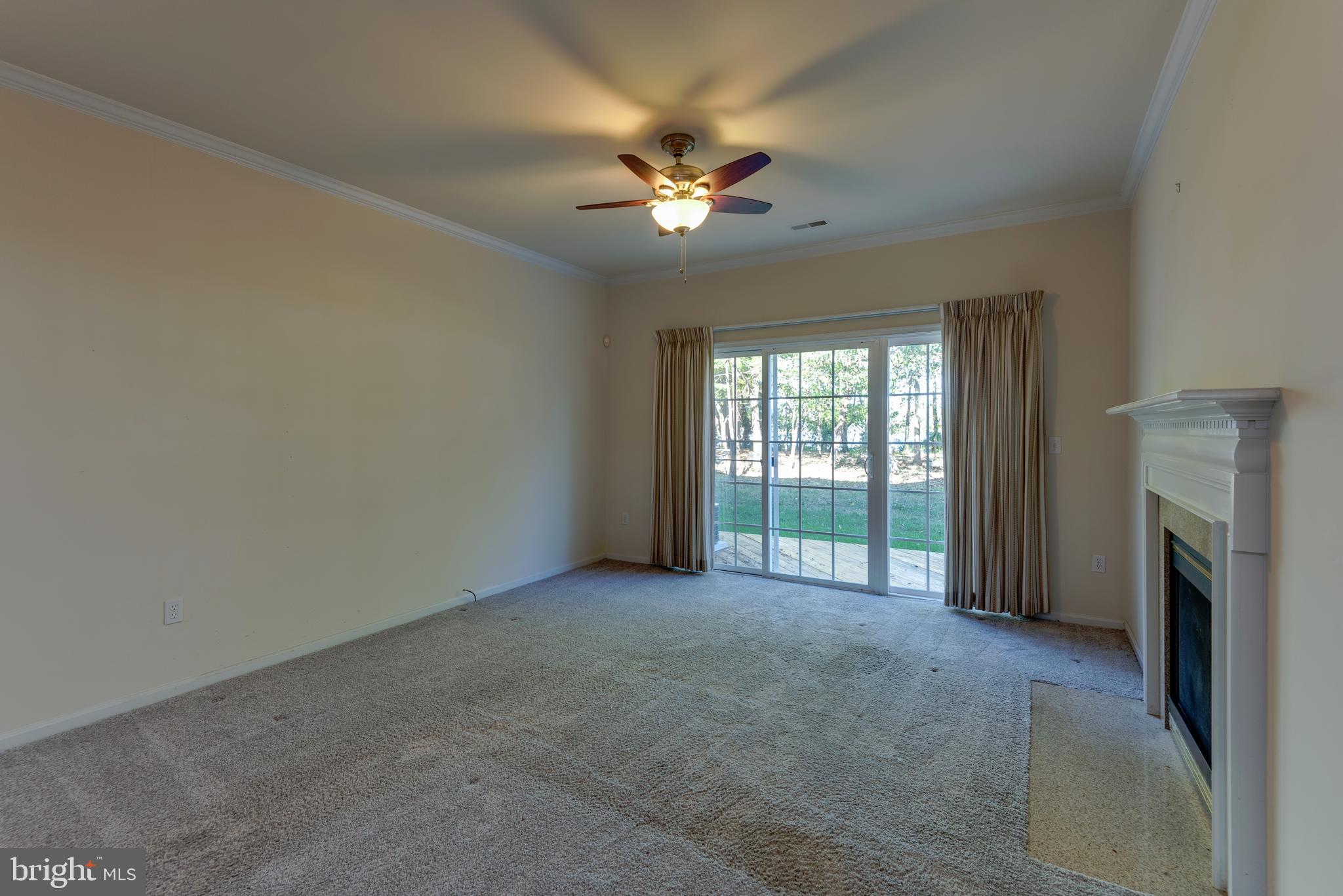 712 Ruxton Road, Unit 68 Solomons, MD 20629 - Photo 12 of 60 Large Family Room with slider to deck...