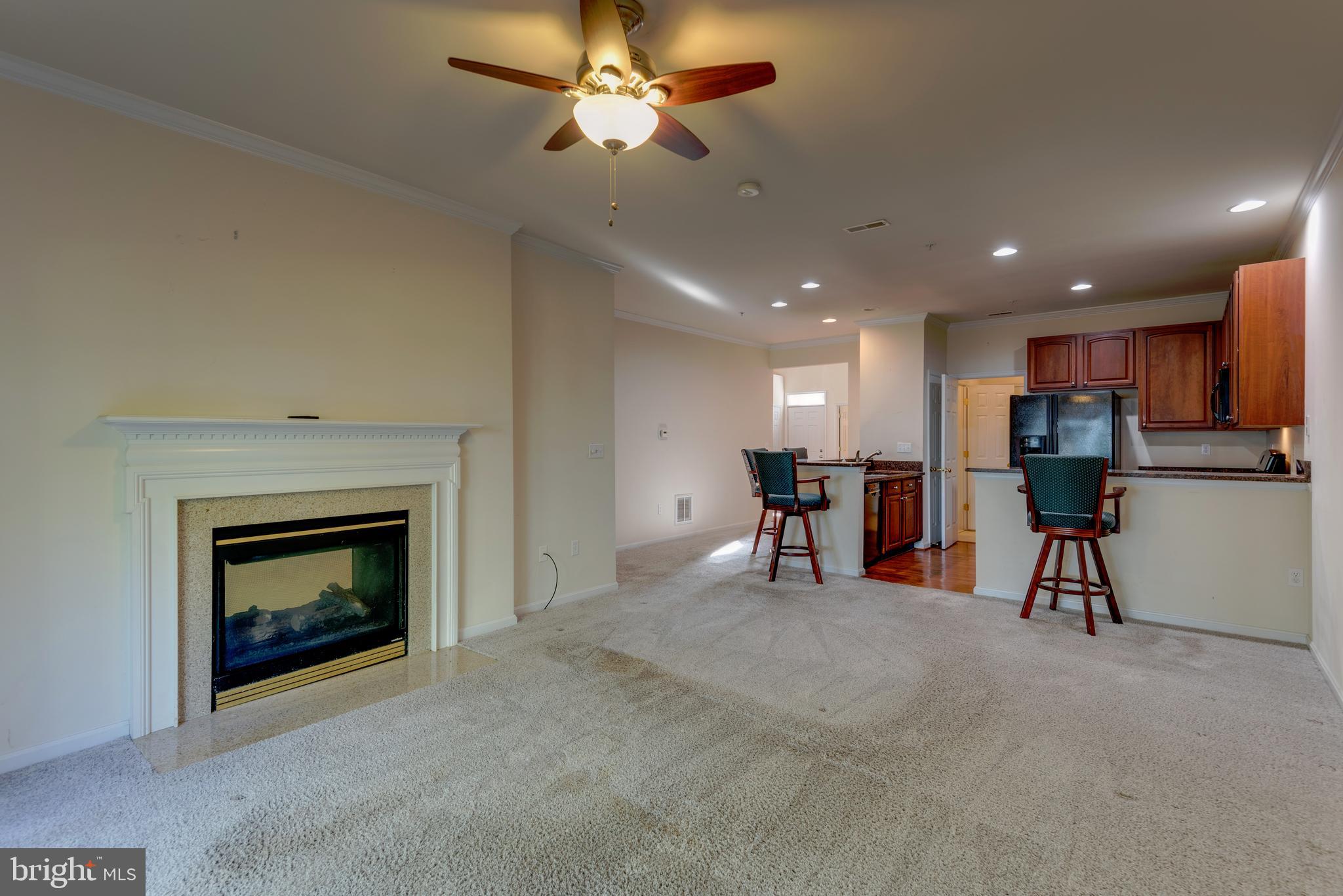 712 Ruxton Road, Unit 68 Solomons, MD 20629 - Photo 14 of 60 Double sided fireplace to enjoy in Family Room