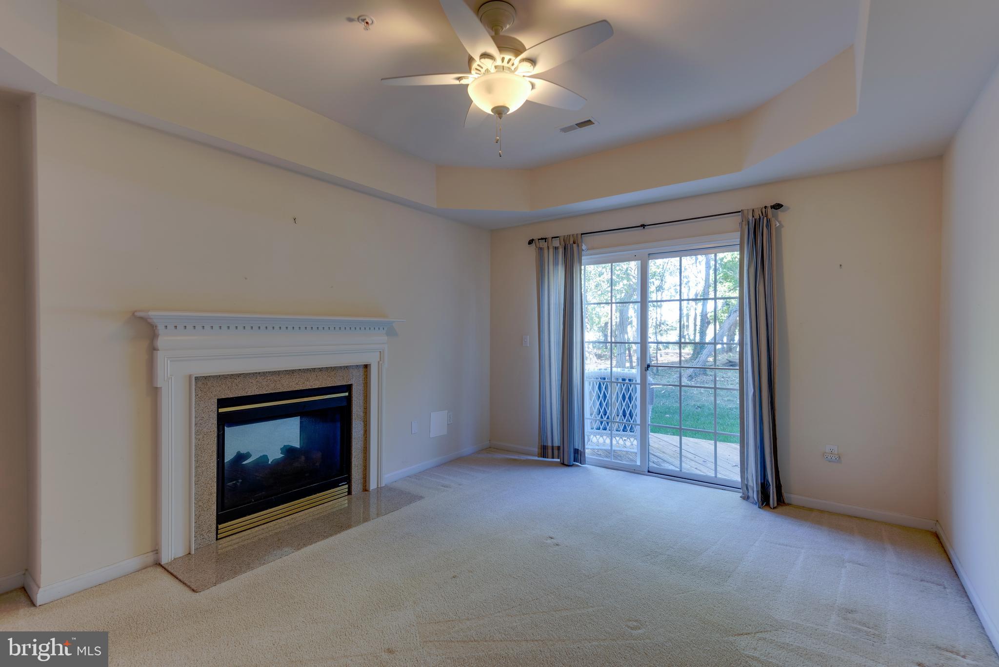 712 Ruxton Road, Unit 68 Solomons, MD 20629 - Photo 18 of 60 Owner's Suite with double sided Fireplace