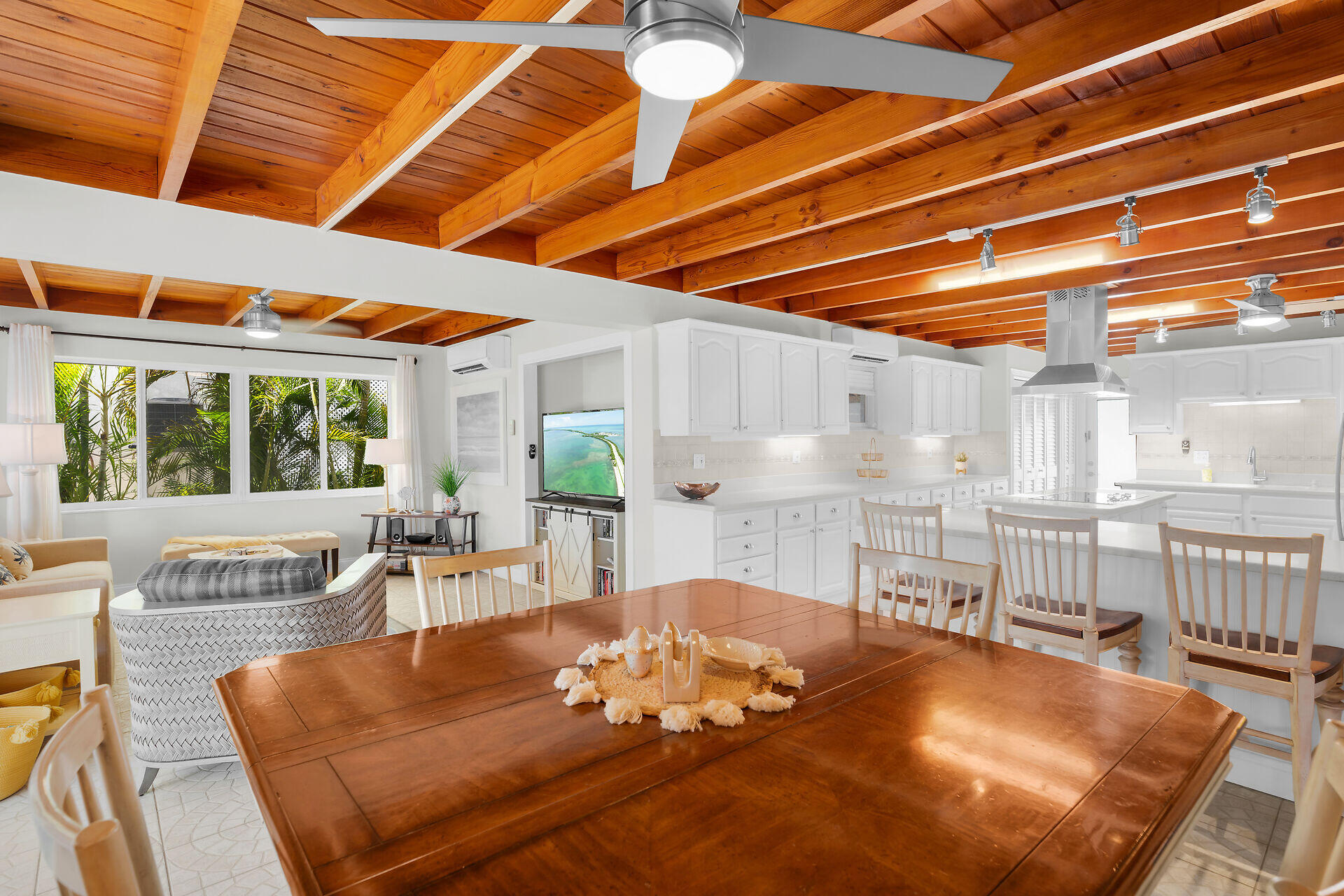 351 5th Street Key Colony Beach, FL 33051 - Photo 22 of 43 a living room with furniture a large window with kitchen view