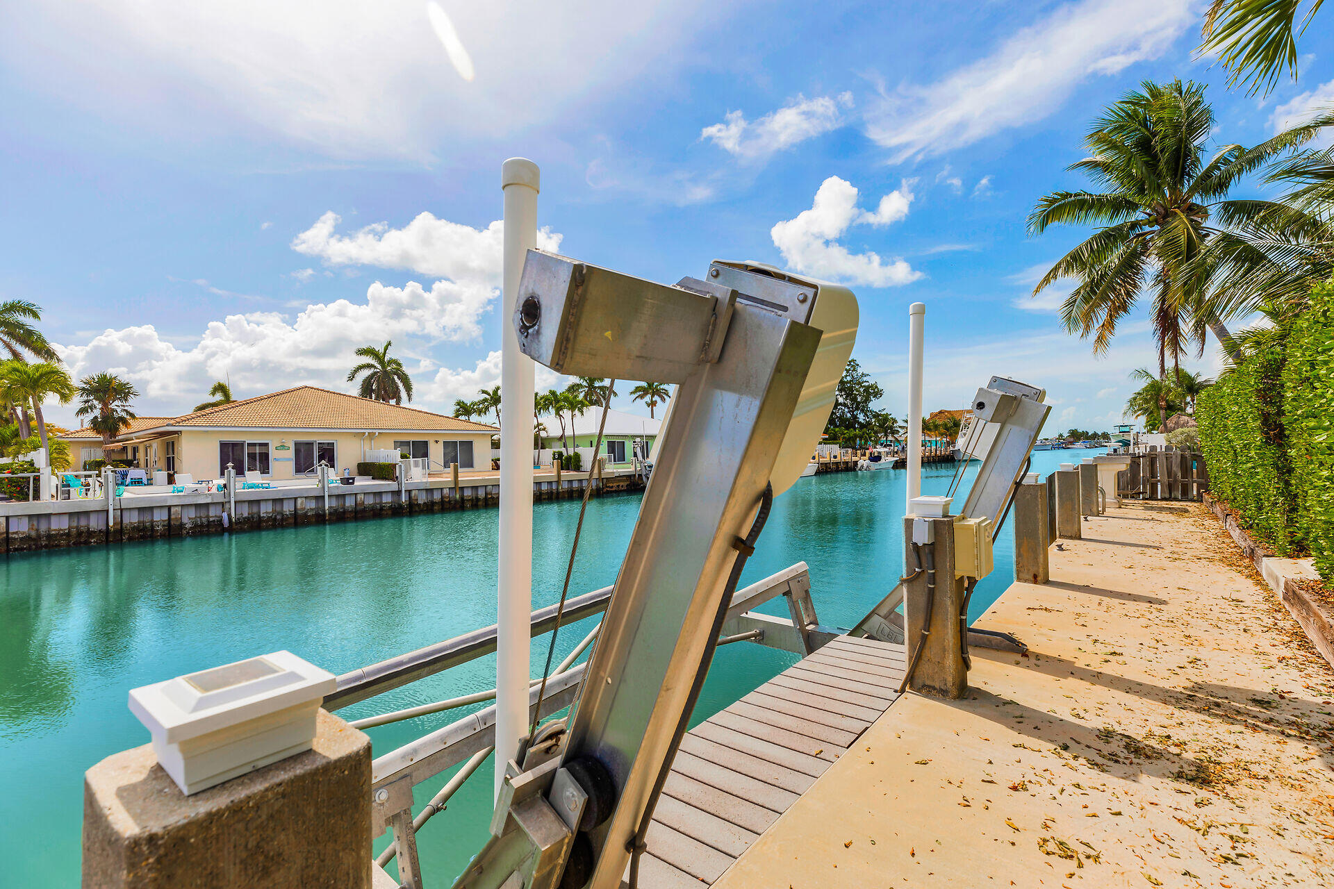 351 5th Street Key Colony Beach, FL 33051 - Photo 39 of 43 a view of a lake with a house swimming pool and outdoor space