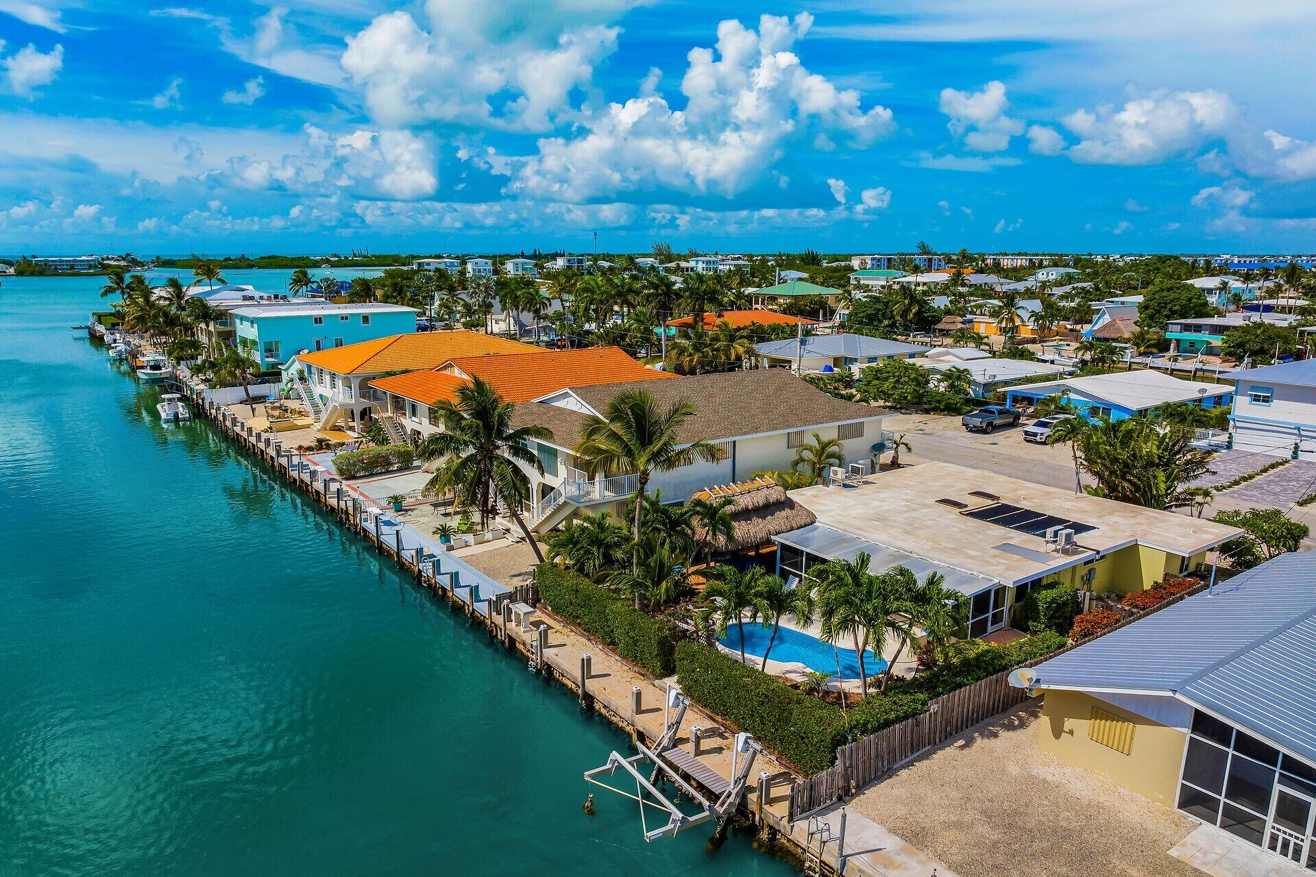 351 5th Street Key Colony Beach, FL 33051 - Photo 8 of 43 an aerial view of a house with a garden