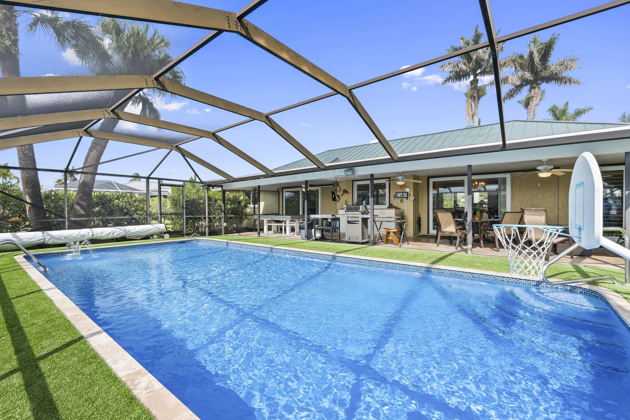 3374 Southeast Fairway East Stuart, FL 34997 - Photo 34 of 65 a view of swimming pool with a patio