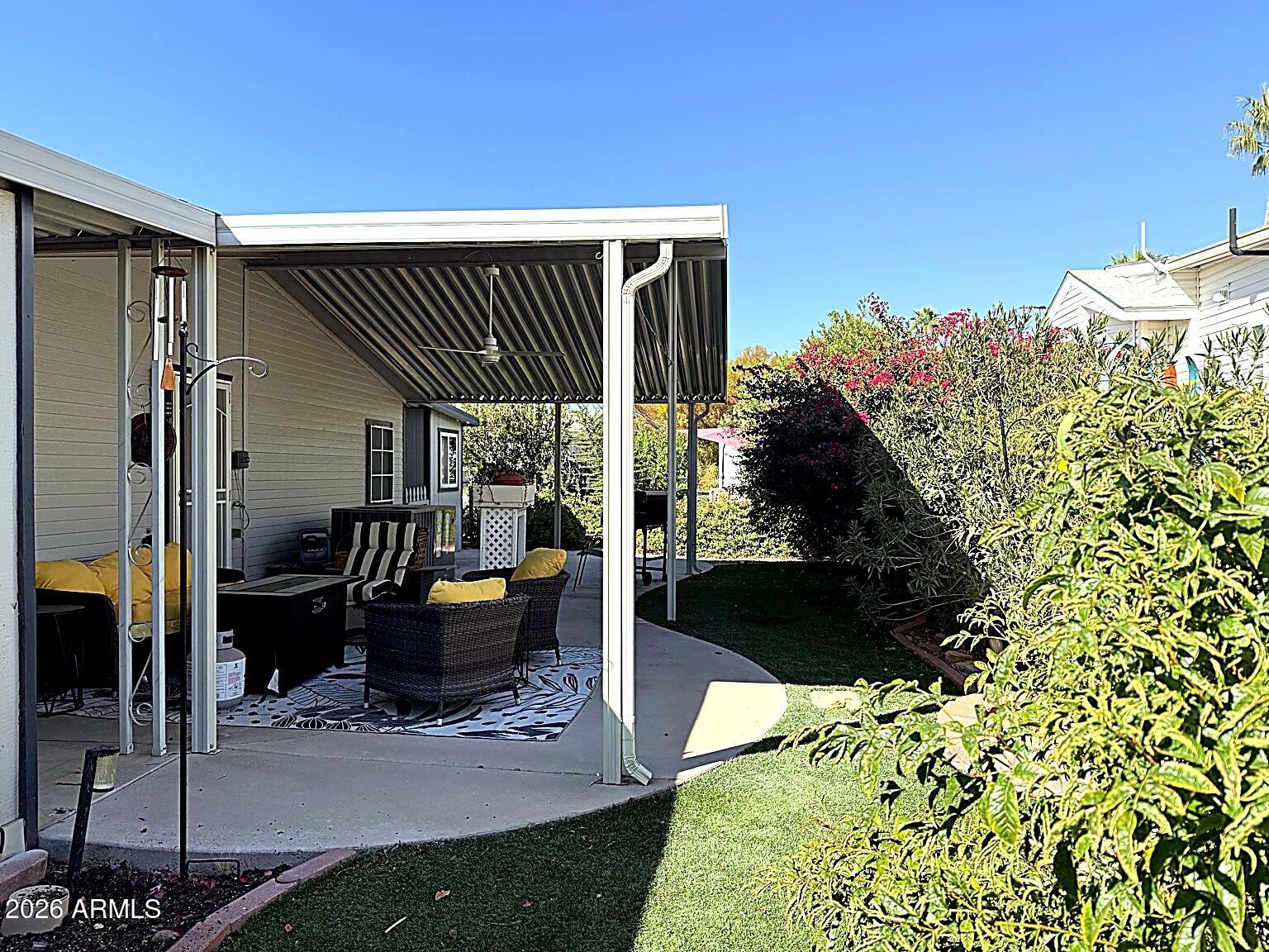 2400 East Baseline Avenue, Unit 30 Apache Junction, AZ 85119 - Photo 11 of 22 back_covered_patio_enhanced