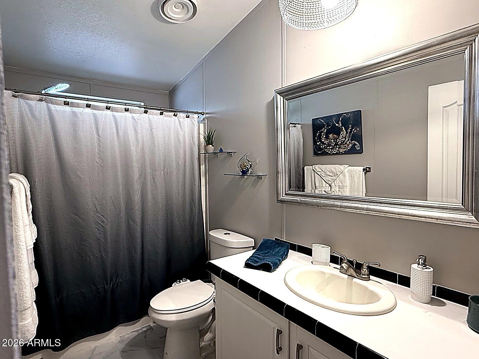 2400 East Baseline Avenue, Unit 30 Apache Junction, AZ 85119 - Photo 10 of 22 bath1_enhanced