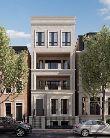 a front view of a residential apartment building with a yard