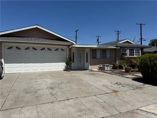 a front view of a house with yard
