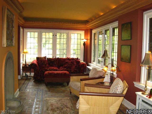 2944 Winthrop Road Cleveland, OH 44120 - Photo 5 of 25 Fantastic sun room / family room with Italian tile floor, built in shelves and door leading to the rear yard with brick patio.