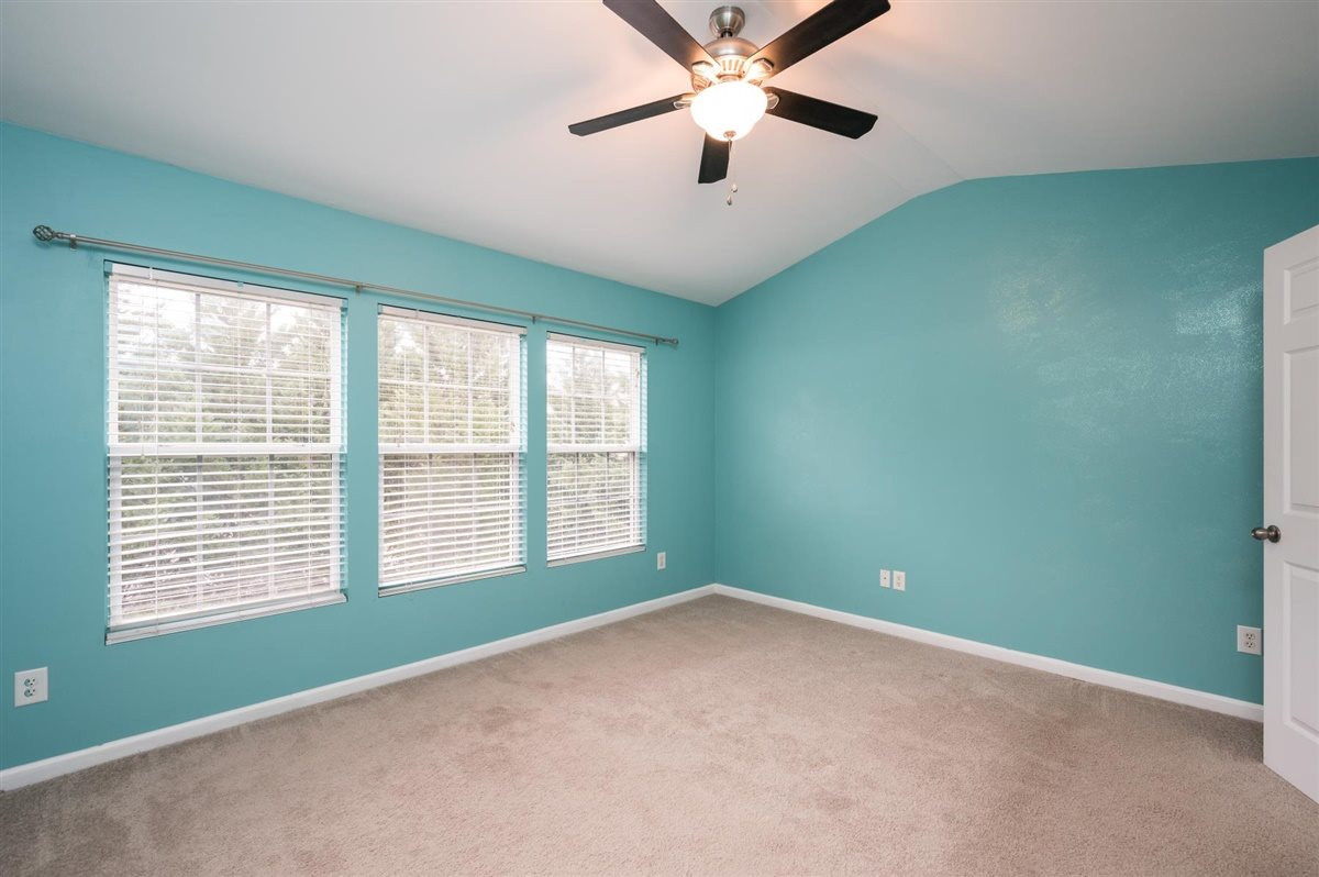 8311 Clasara Circle Raleigh, NC 27613 - Photo 17 of 27 Large master bedroom with vaulted ceiling and attached bath Master Bedroom