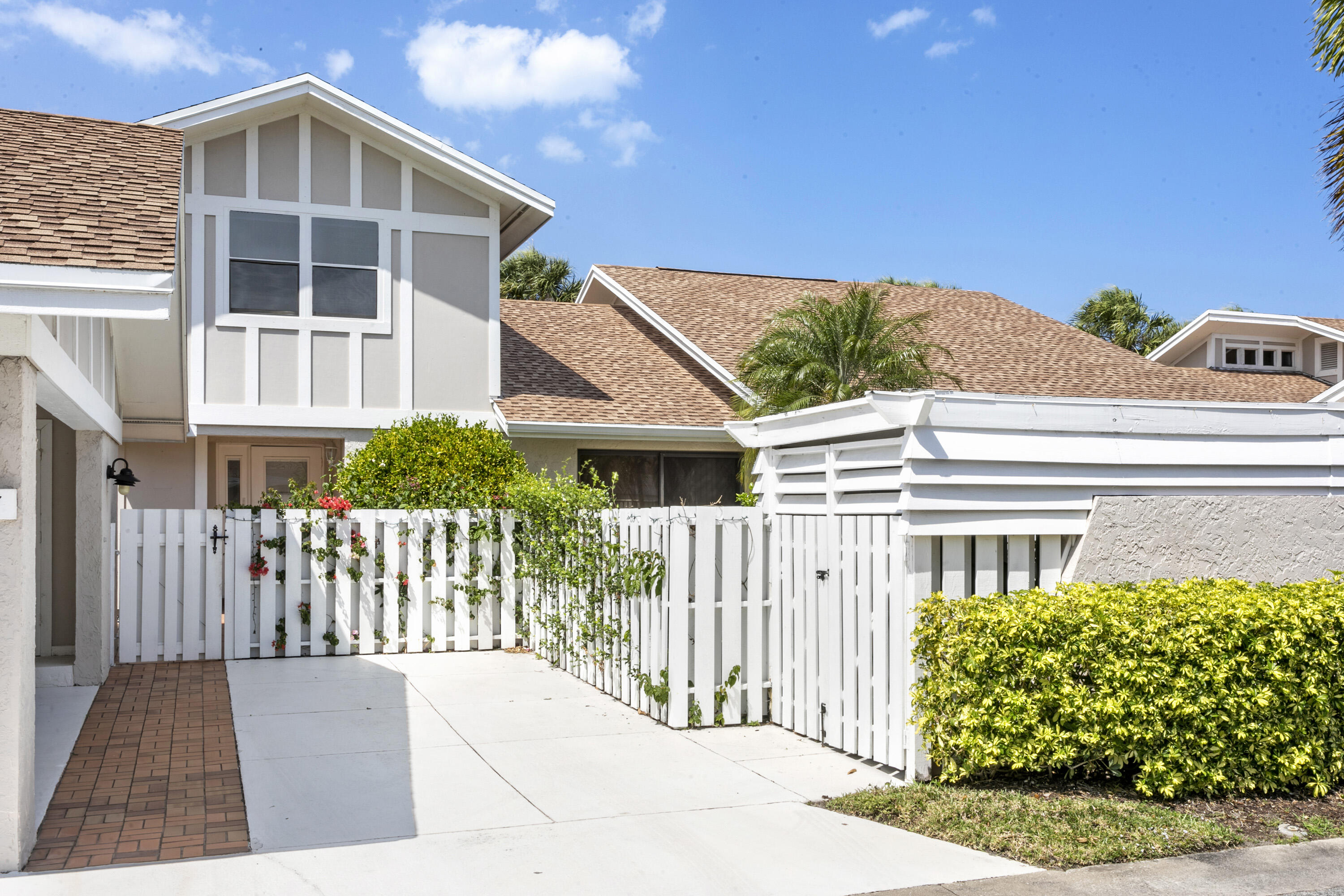 3697 Cape Pointe Circle Jupiter, FL 33477 - Photo 2 of 55 a view of a house with a yard