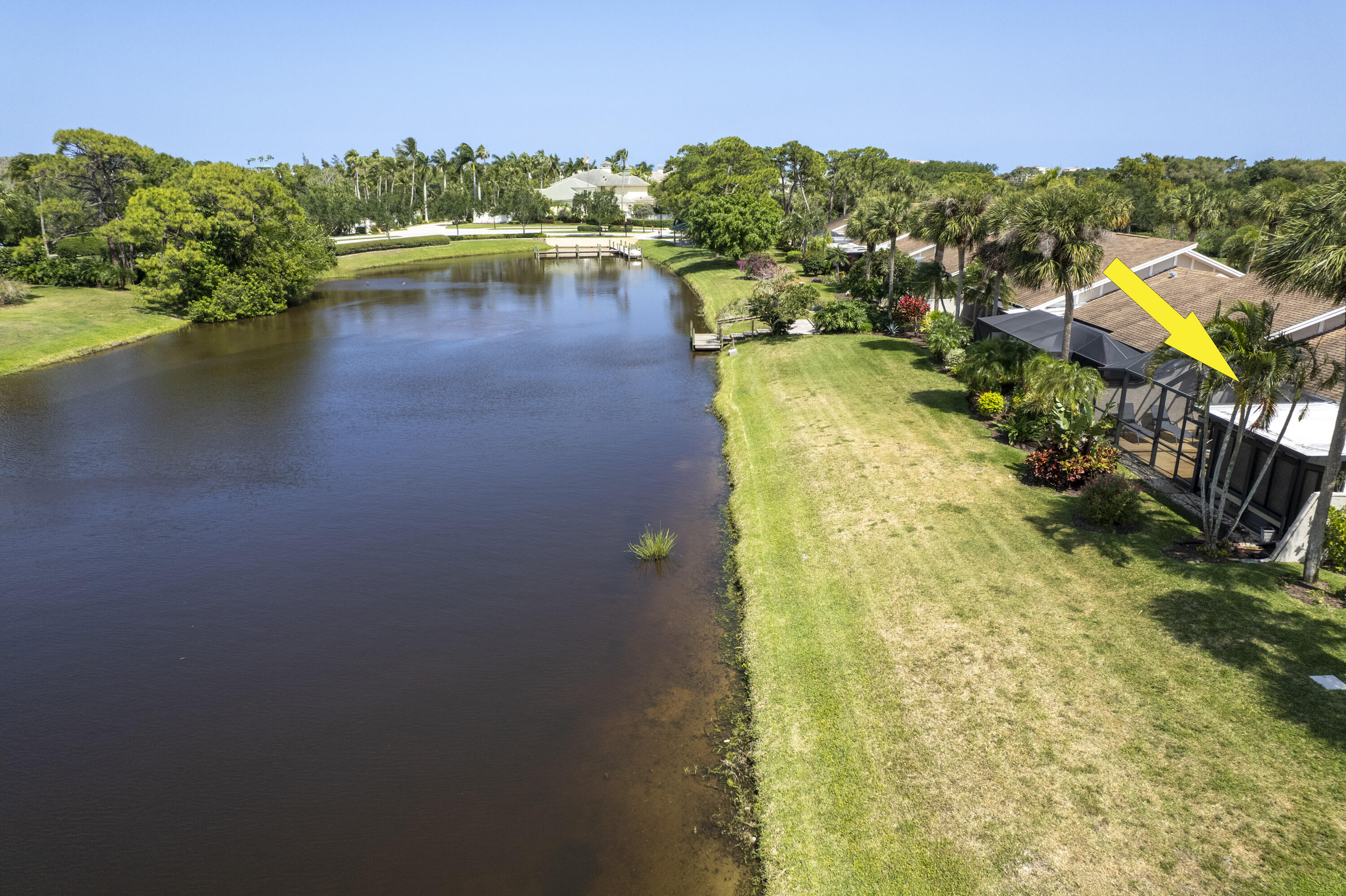 3697 Cape Pointe Circle Jupiter, FL 33477 - Photo 46 of 55 a view of a lake with houses