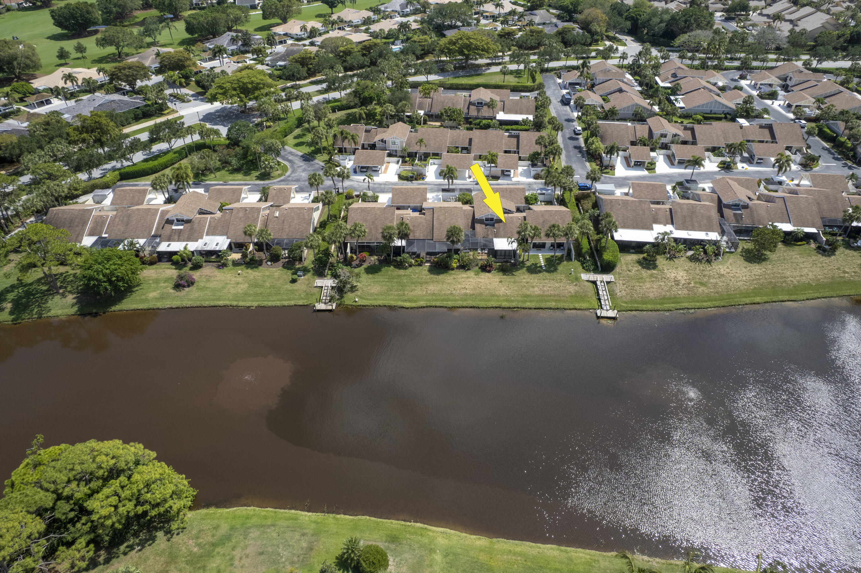 3697 Cape Pointe Circle Jupiter, FL 33477 - Photo 52 of 55 an aerial view of residential houses with outdoor space and street view