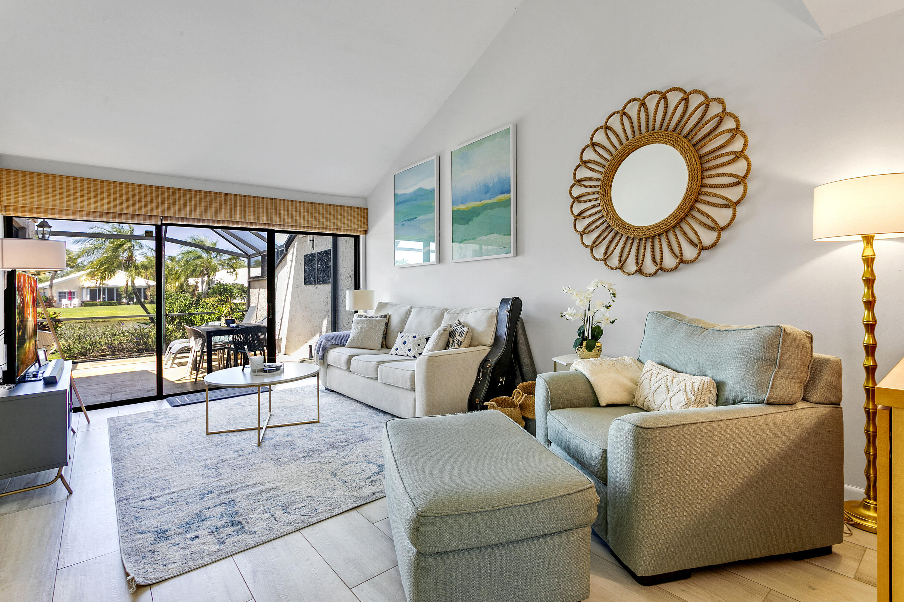 3697 Cape Pointe Circle Jupiter, FL 33477 - Photo 8 of 55 a living room with furniture and a large window