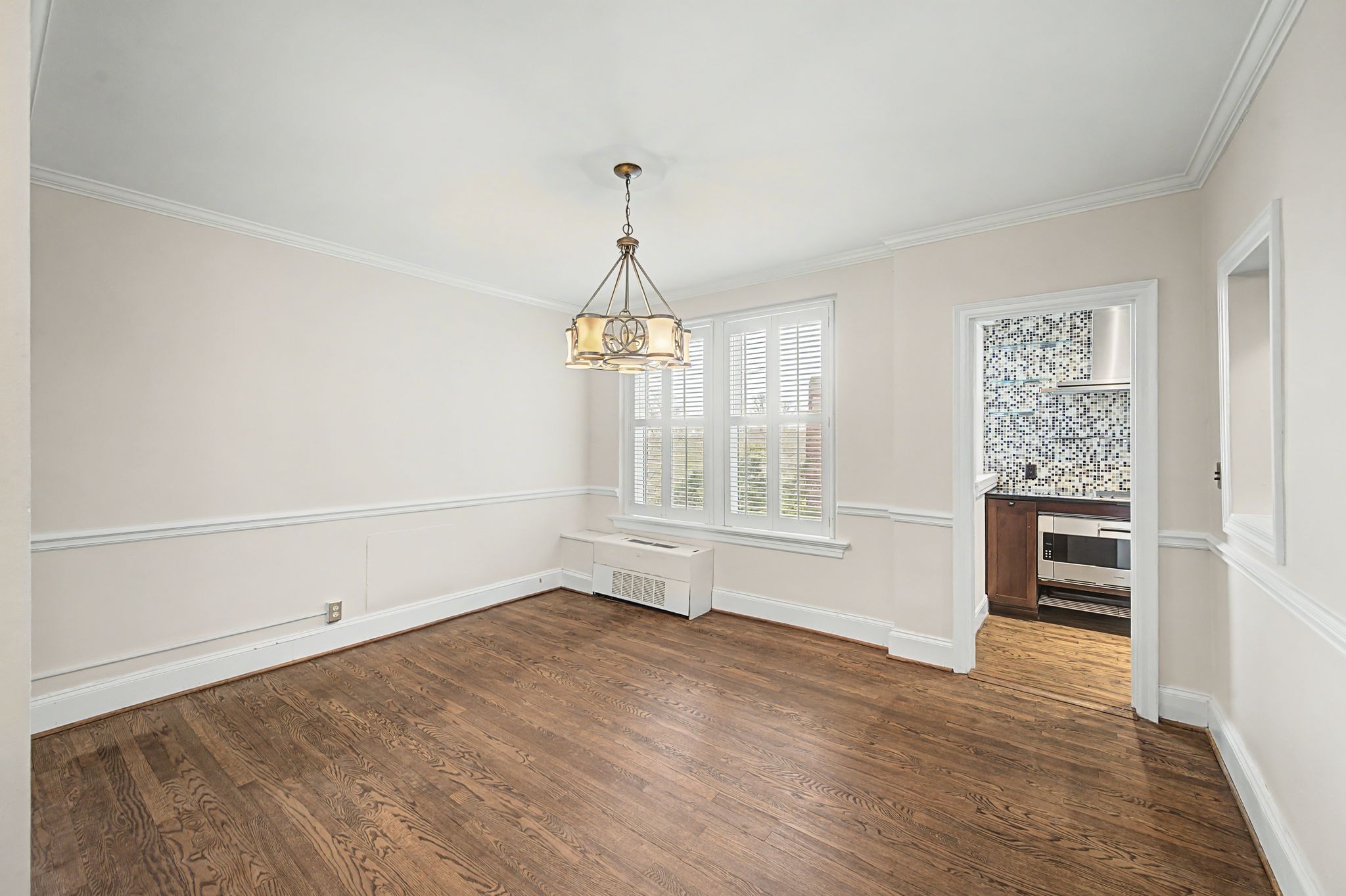 4225 Harding Pike, Unit 603 Nashville, TN 37205 - Photo 19 of 59 an empty room with wooden floor cabinet and windows