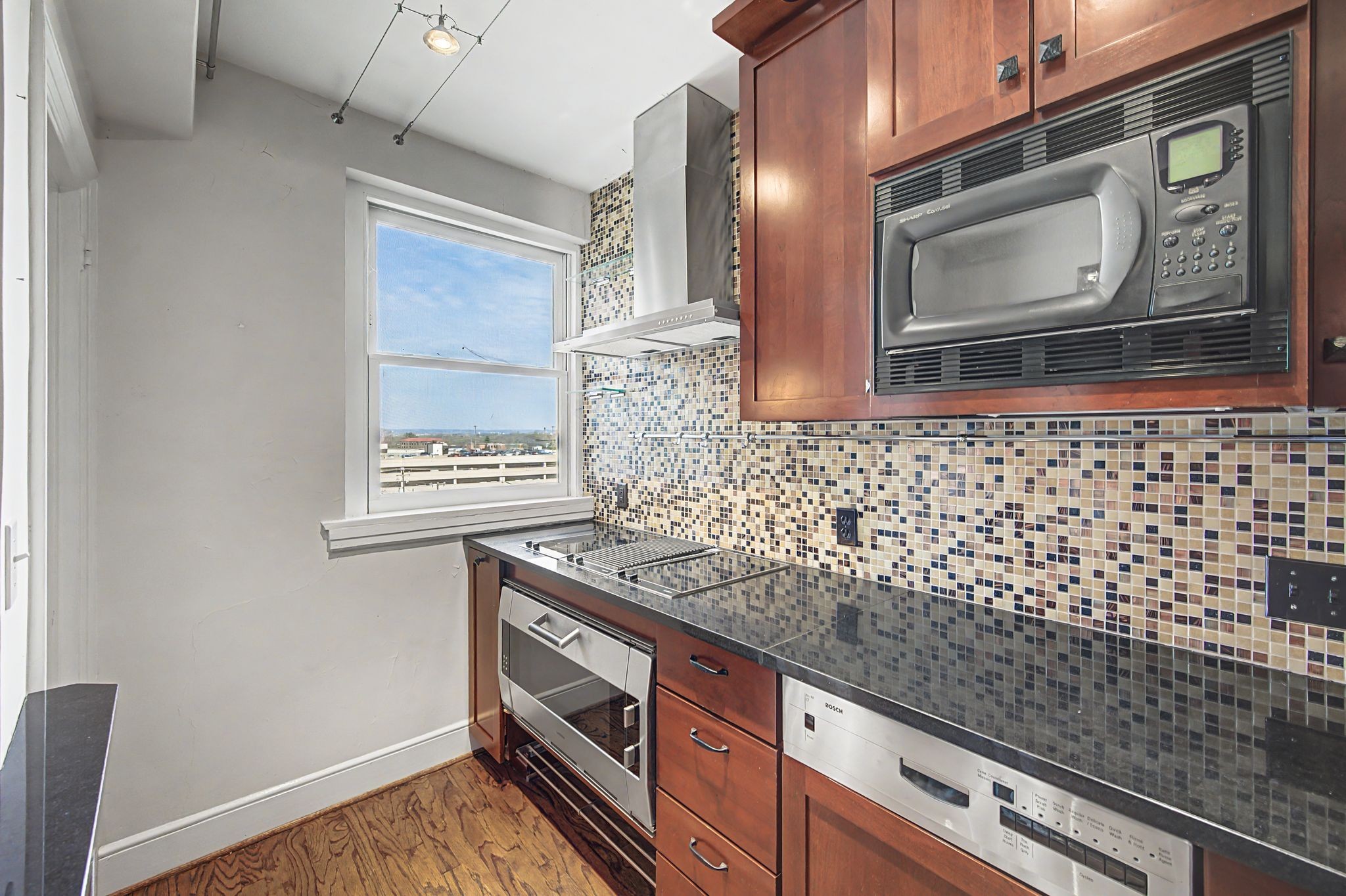 4225 Harding Pike, Unit 603 Nashville, TN 37205 - Photo 27 of 59 a bathroom with a sink a vanity and a window
