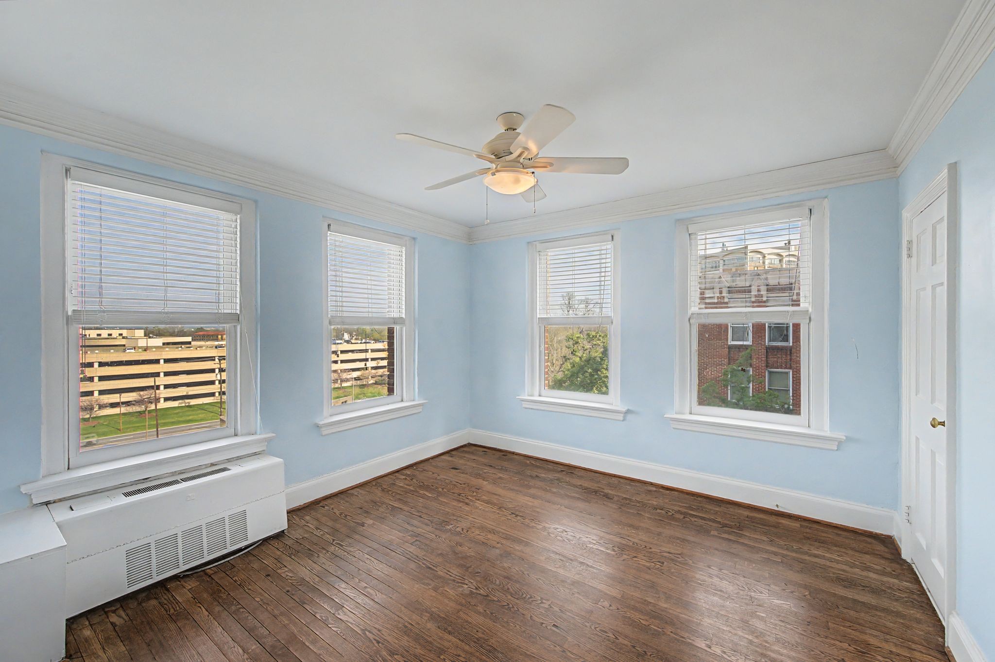 4225 Harding Pike, Unit 603 Nashville, TN 37205 - Photo 29 of 59 a view of an empty room with a window and wooden floor