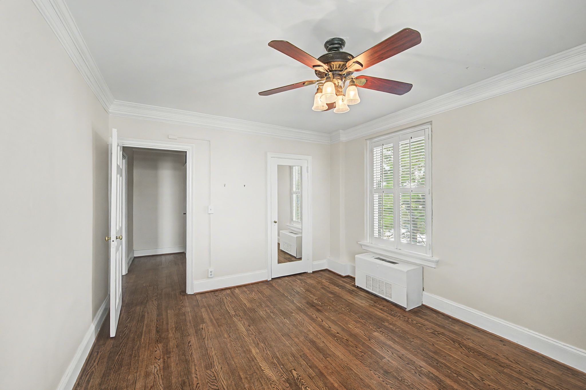 4225 Harding Pike, Unit 603 Nashville, TN 37205 - Photo 35 of 59 an empty room with wooden floor fan and windows