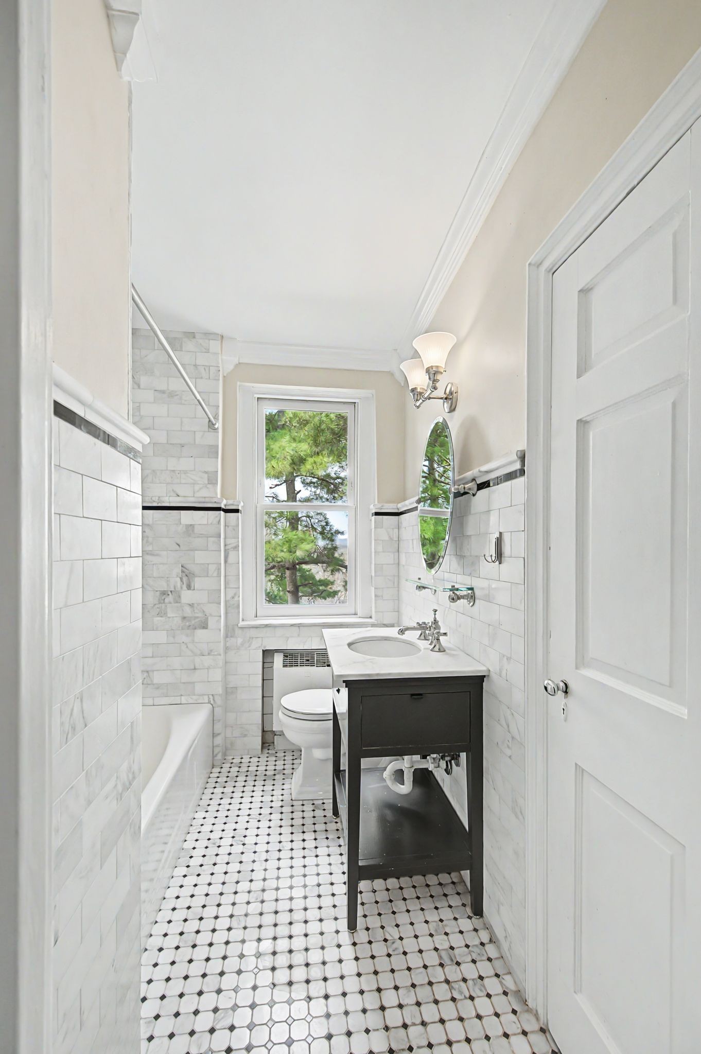 4225 Harding Pike, Unit 603 Nashville, TN 37205 - Photo 37 of 59 a bathroom with a sink a toilet a mirror and shower