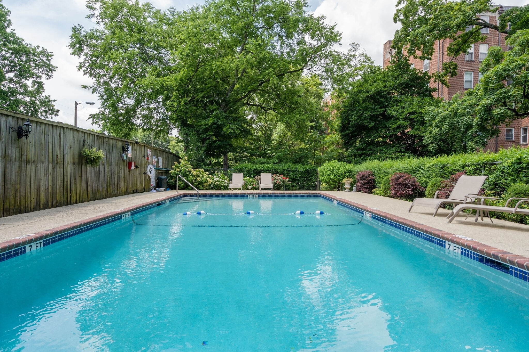 4225 Harding Pike, Unit 603 Nashville, TN 37205 - Photo 49 of 59 a view of a swimming pool with a patio