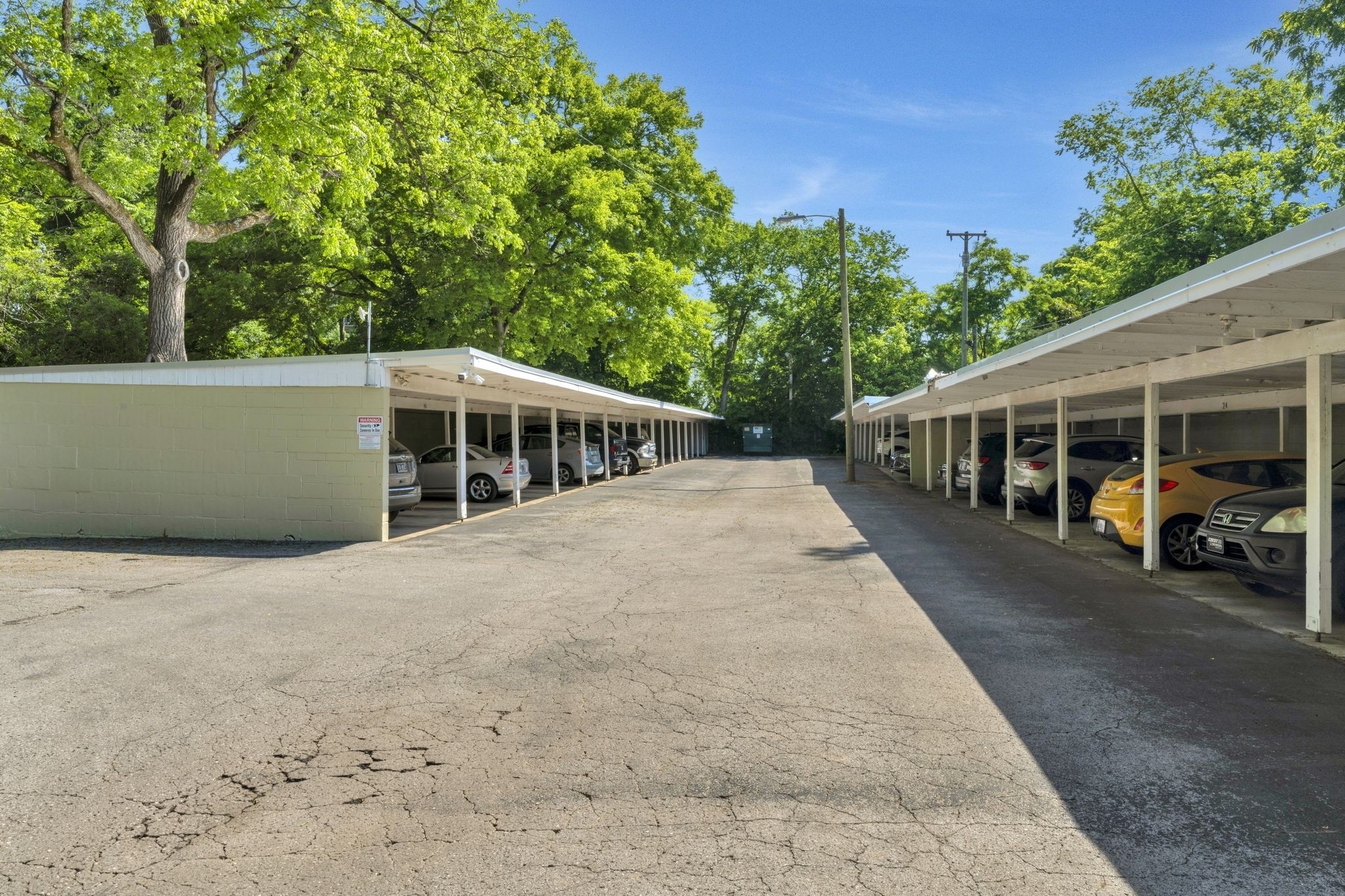 4225 Harding Pike, Unit 603 Nashville, TN 37205 - Photo 50 of 59 a house with trees in the background