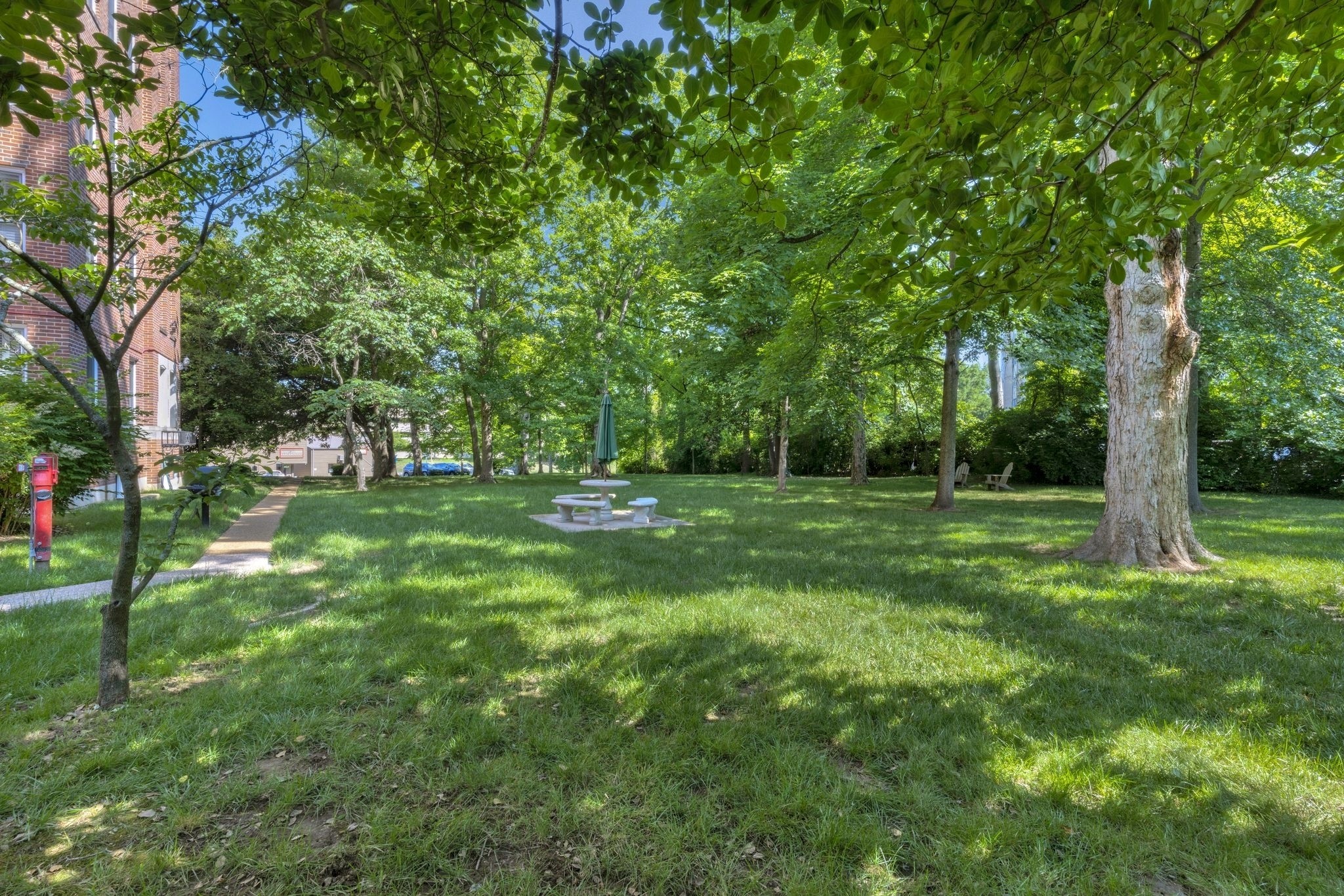 4225 Harding Pike, Unit 603 Nashville, TN 37205 - Photo 51 of 59 a view of green field with trees in the background