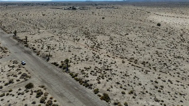 a view of a road with an ocean view