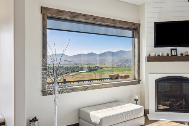 6117 North Rocky Ridge Road Peoa, UT 84061 - Photo 15 of 82 Expansive picture window with wood-finish trim