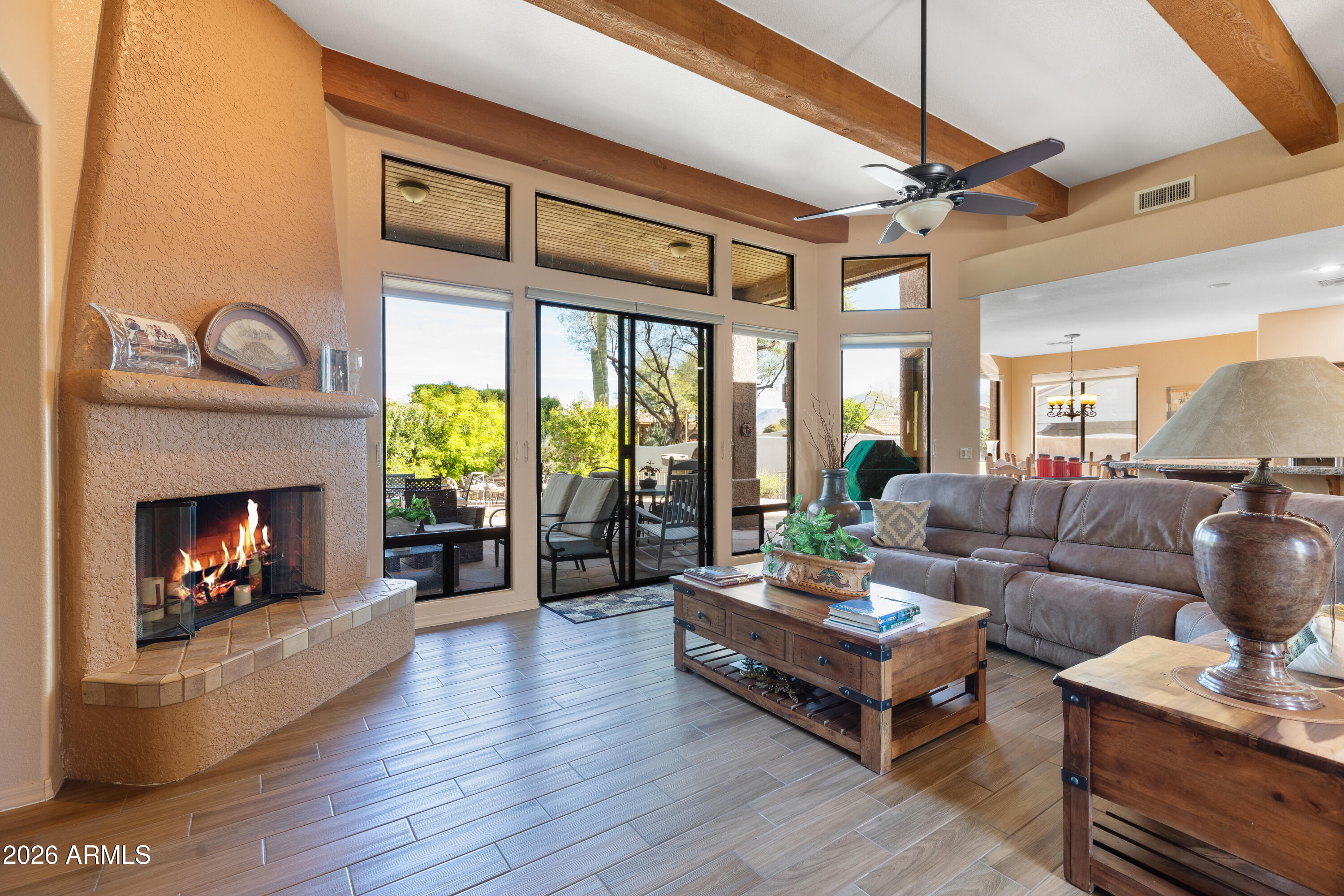 18622 North Tonto Verde Drive Rio Verde, AZ 85263 - Photo 2 of 47 a living room with furniture and a fireplace