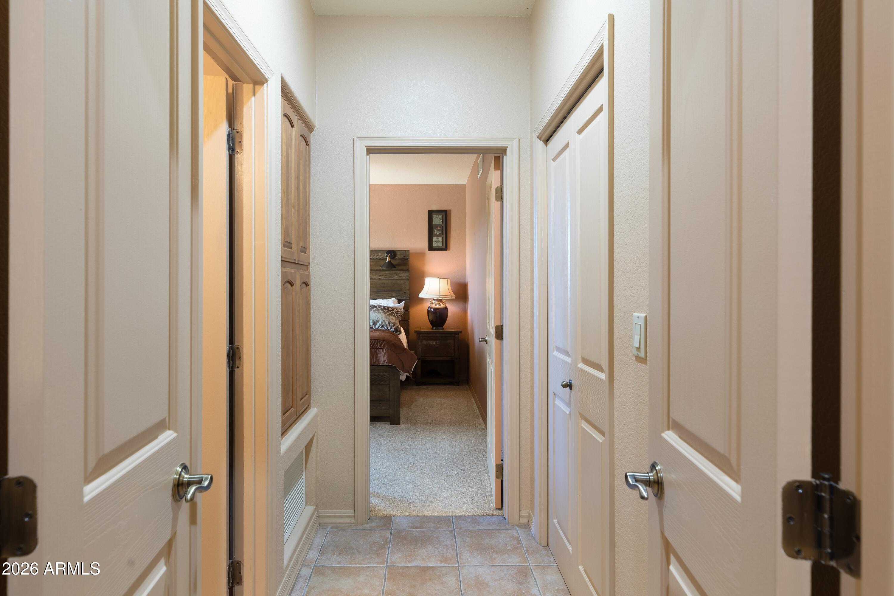 18622 North Tonto Verde Drive Rio Verde, AZ 85263 - Photo 27 of 47 a view of a hallway with a livingroom and a rooms