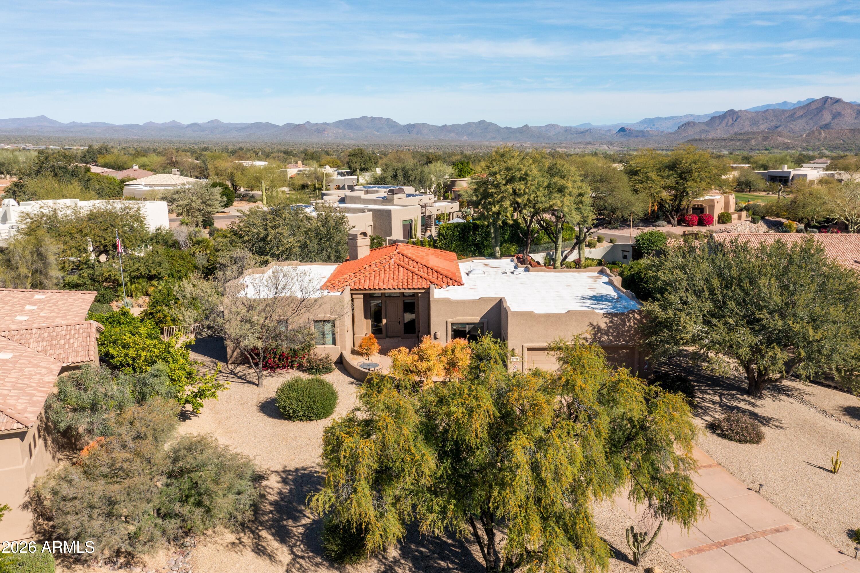 18622 North Tonto Verde Drive Rio Verde, AZ 85263 - Photo 39 of 47 a view of a city with mountains in the background