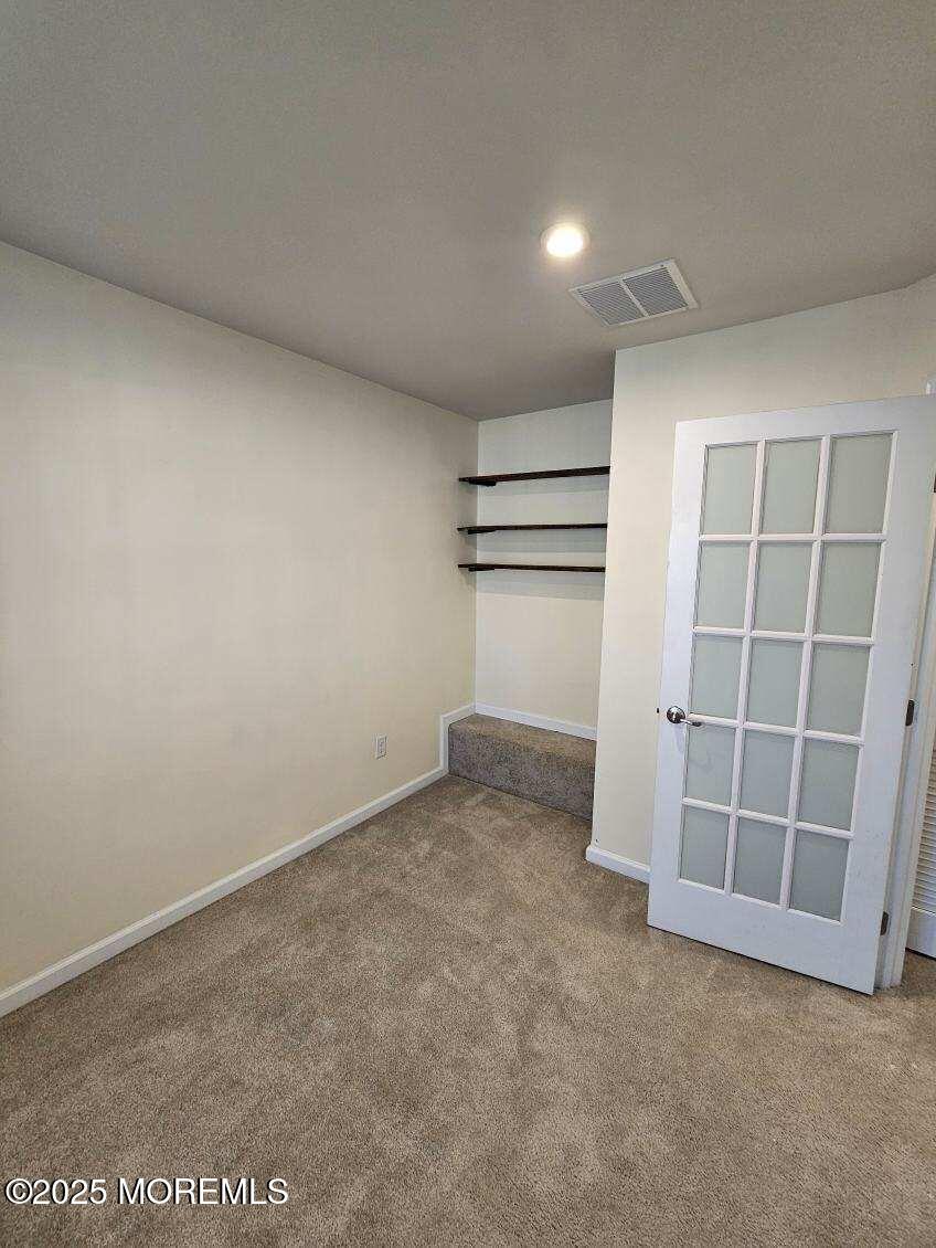 802 Rio Grande Drive, Unit 2002 Toms River, NJ 08755 - Photo 20 of 41 an empty room with a empty space