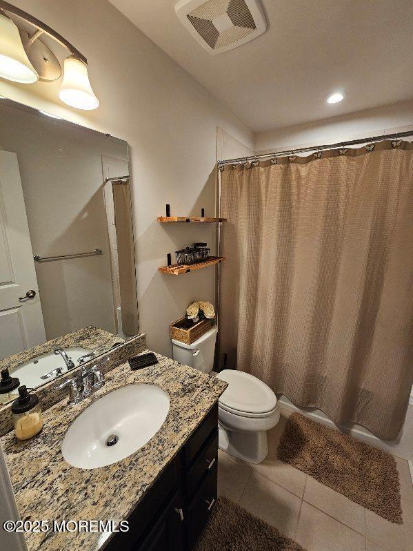 802 Rio Grande Drive, Unit 2002 Toms River, NJ 08755 - Photo 24 of 41 a bathroom with a granite countertop sink and a mirror