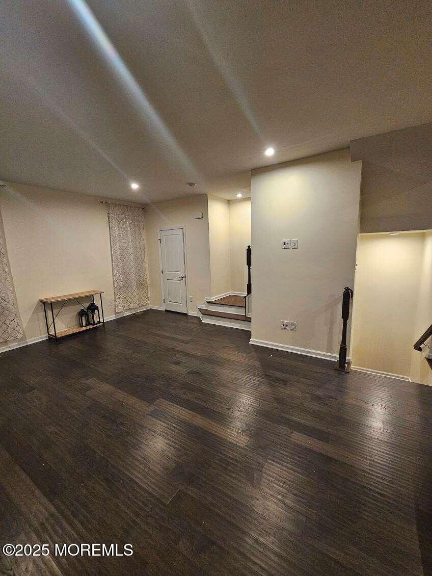 802 Rio Grande Drive, Unit 2002 Toms River, NJ 08755 - Photo 5 of 41 a view of a room with wooden floor