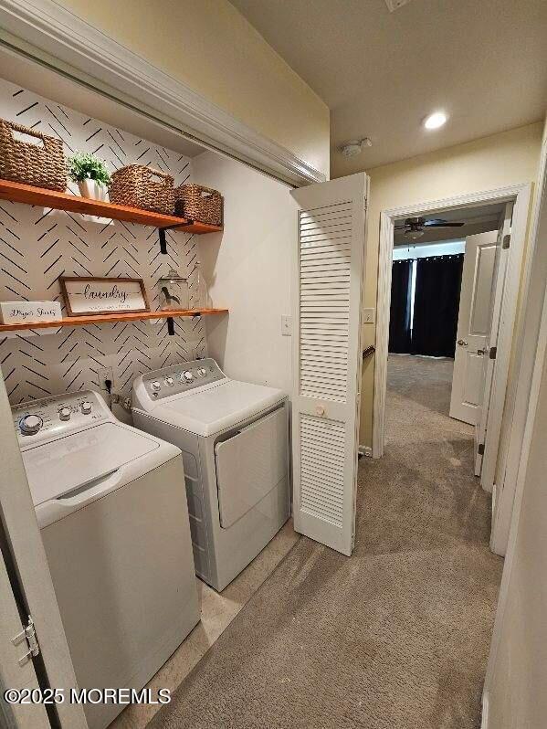 802 Rio Grande Drive, Unit 2002 Toms River, NJ 08755 - Photo 8 of 41 a utility room with dryer and washer