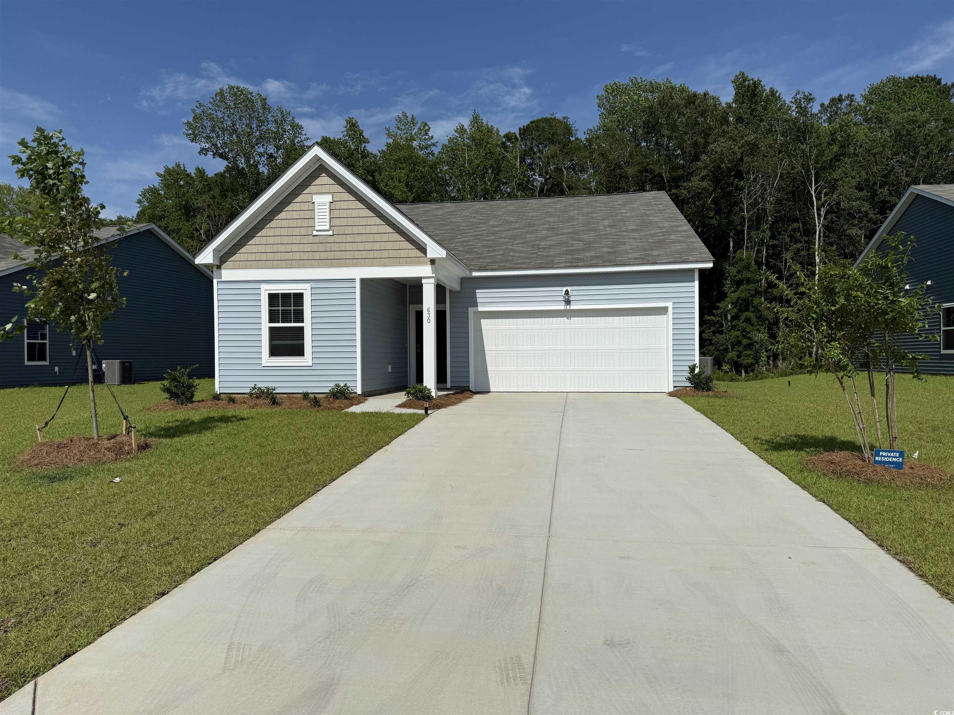 630 Castillo Drive Loris, SC 29569 - Photo 1 of 1 View of front of property with a garage, a front l
