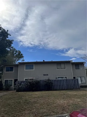 a view of a house with a garden