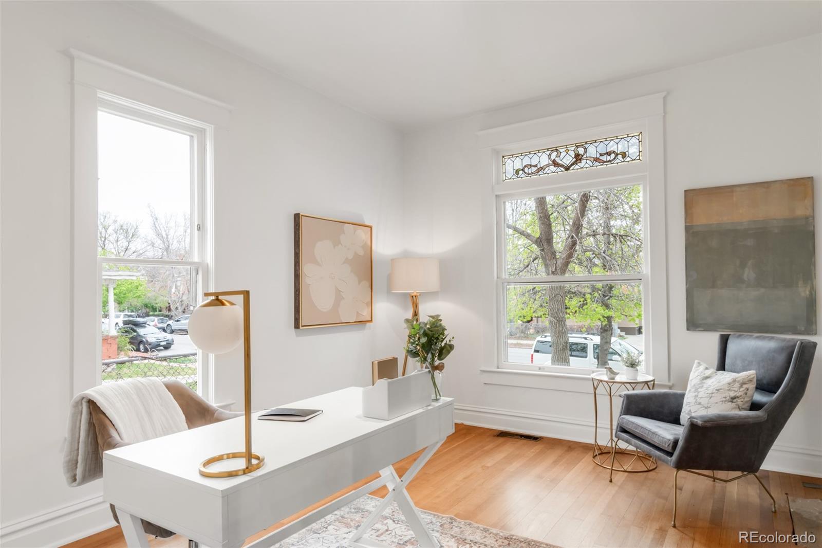 3905 Tejon Street Denver, CO 80211 - Photo 18 of 47 a living room with furniture and a large window