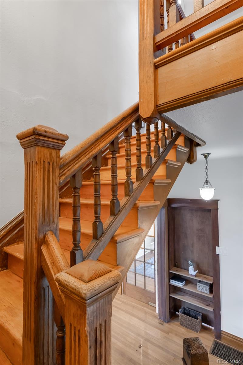 3905 Tejon Street Denver, CO 80211 - Photo 20 of 47 a view of entryway with wooden floor
